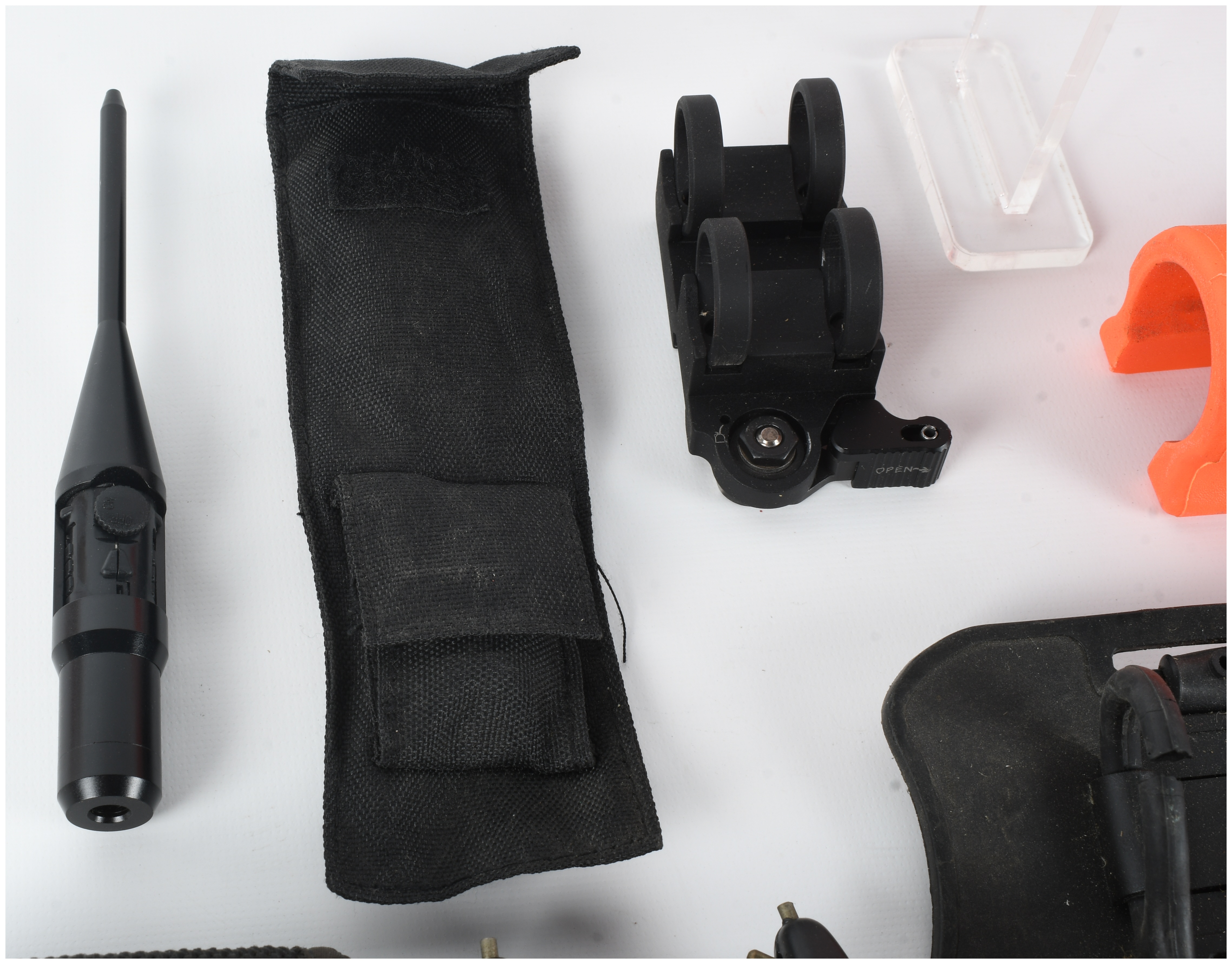 An Assortment of Personal Protection and Field Equipment including Hogue Less Lethal Shotgun Furniture
