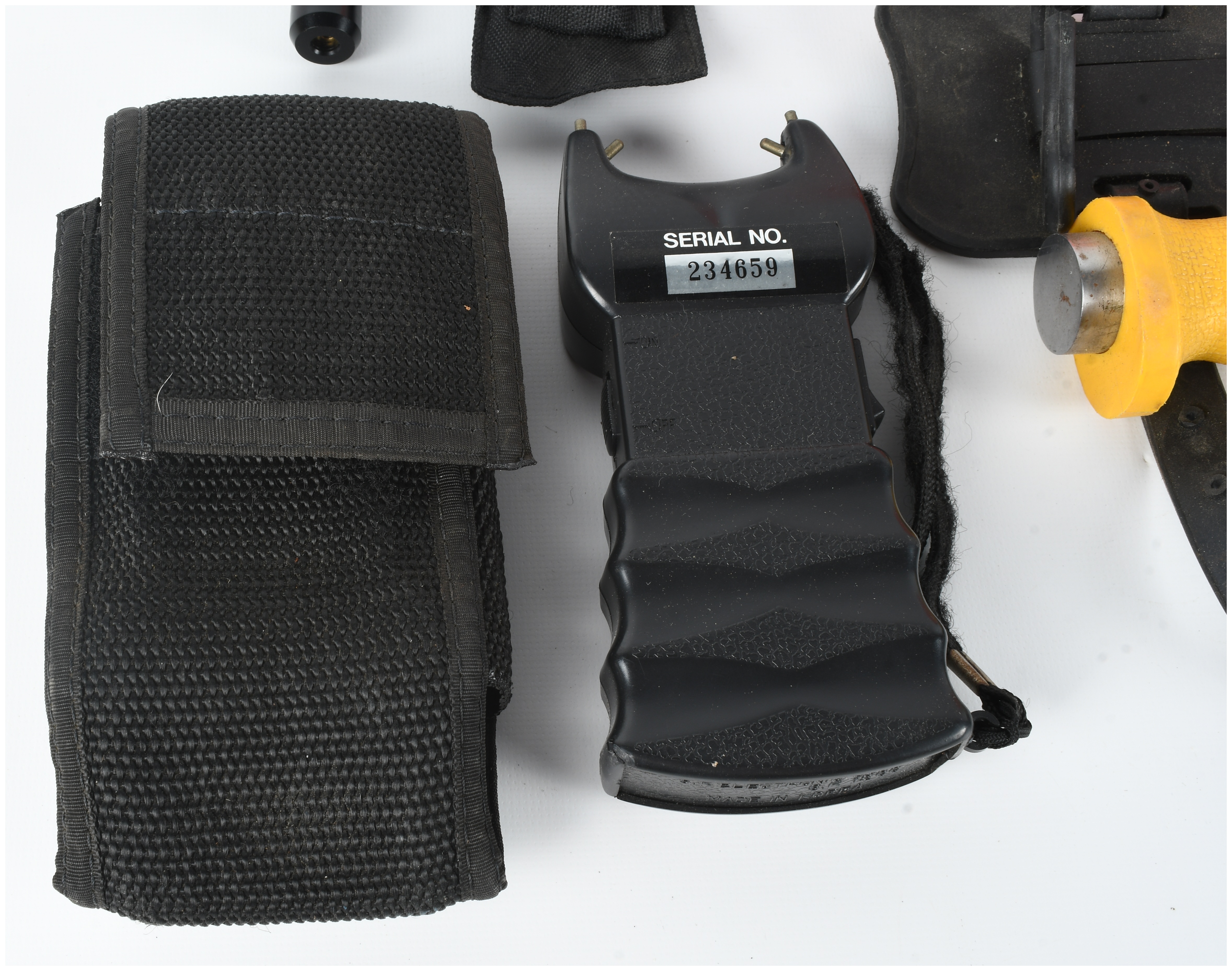 An Assortment of Personal Protection and Field Equipment including Hogue Less Lethal Shotgun Furniture