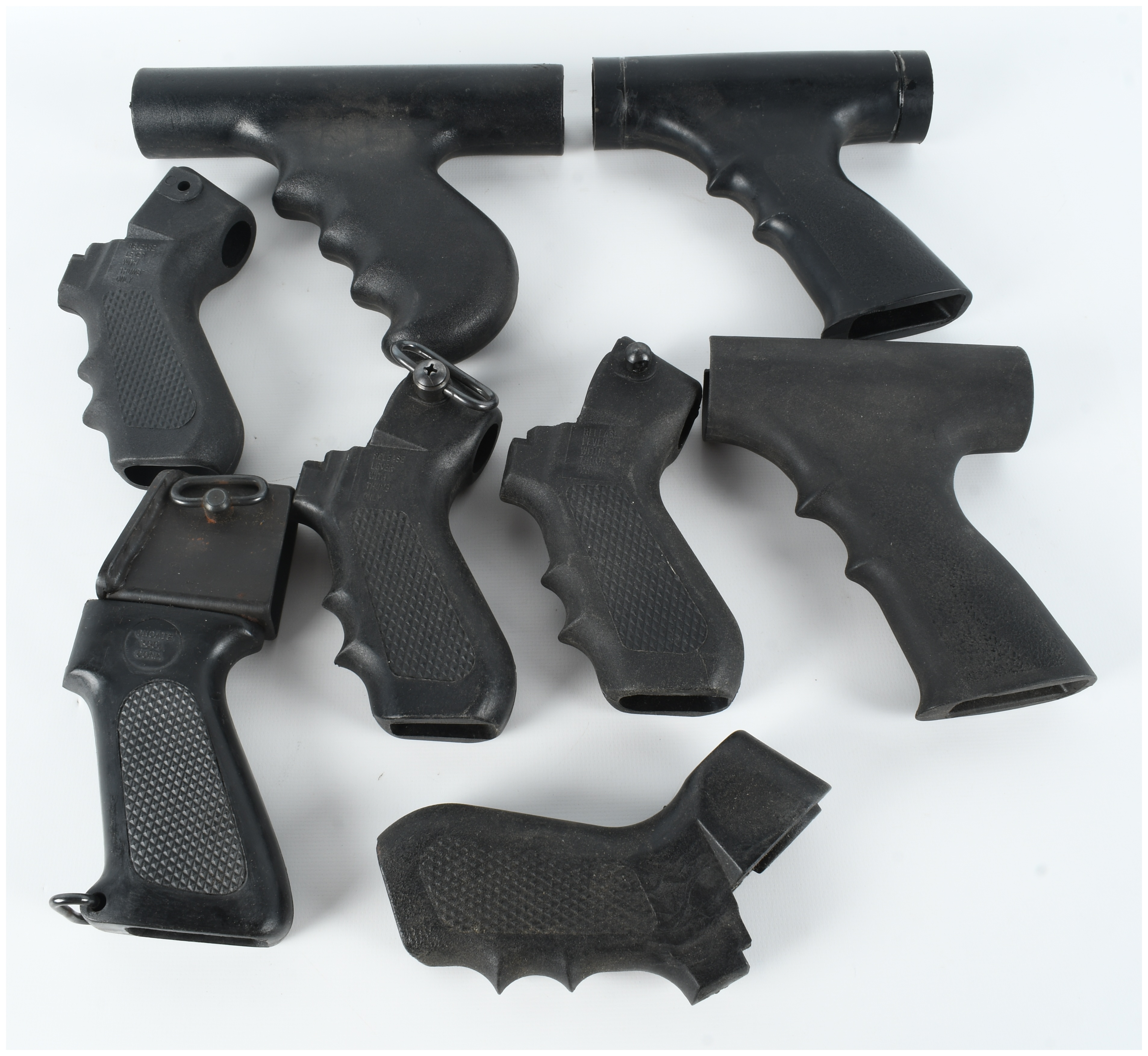 A Collection of 8 Assorted Polymer Shotgun Pistol Grips and Folding Stock Components