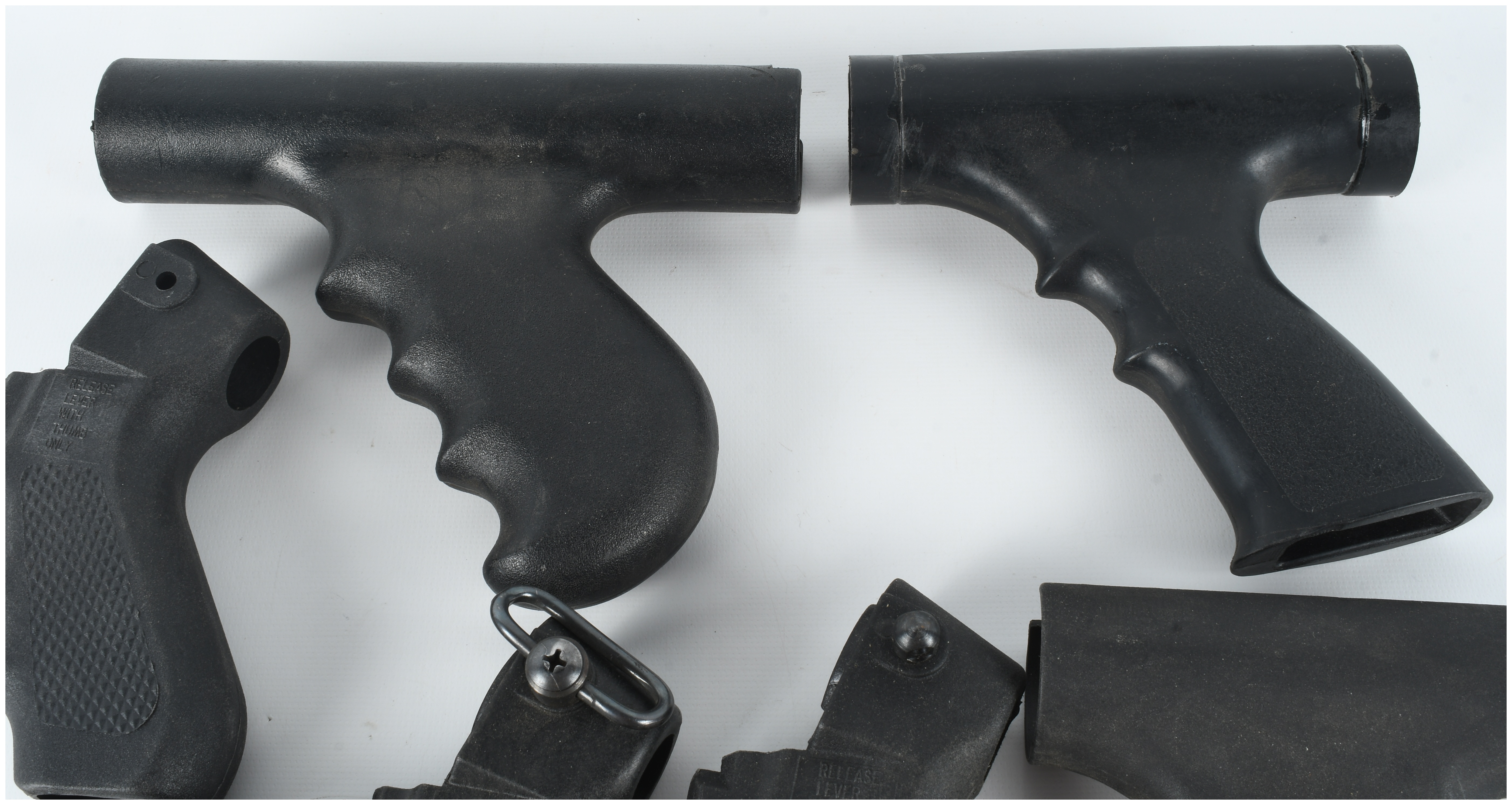 A Collection of 8 Assorted Polymer Shotgun Pistol Grips and Folding Stock Components