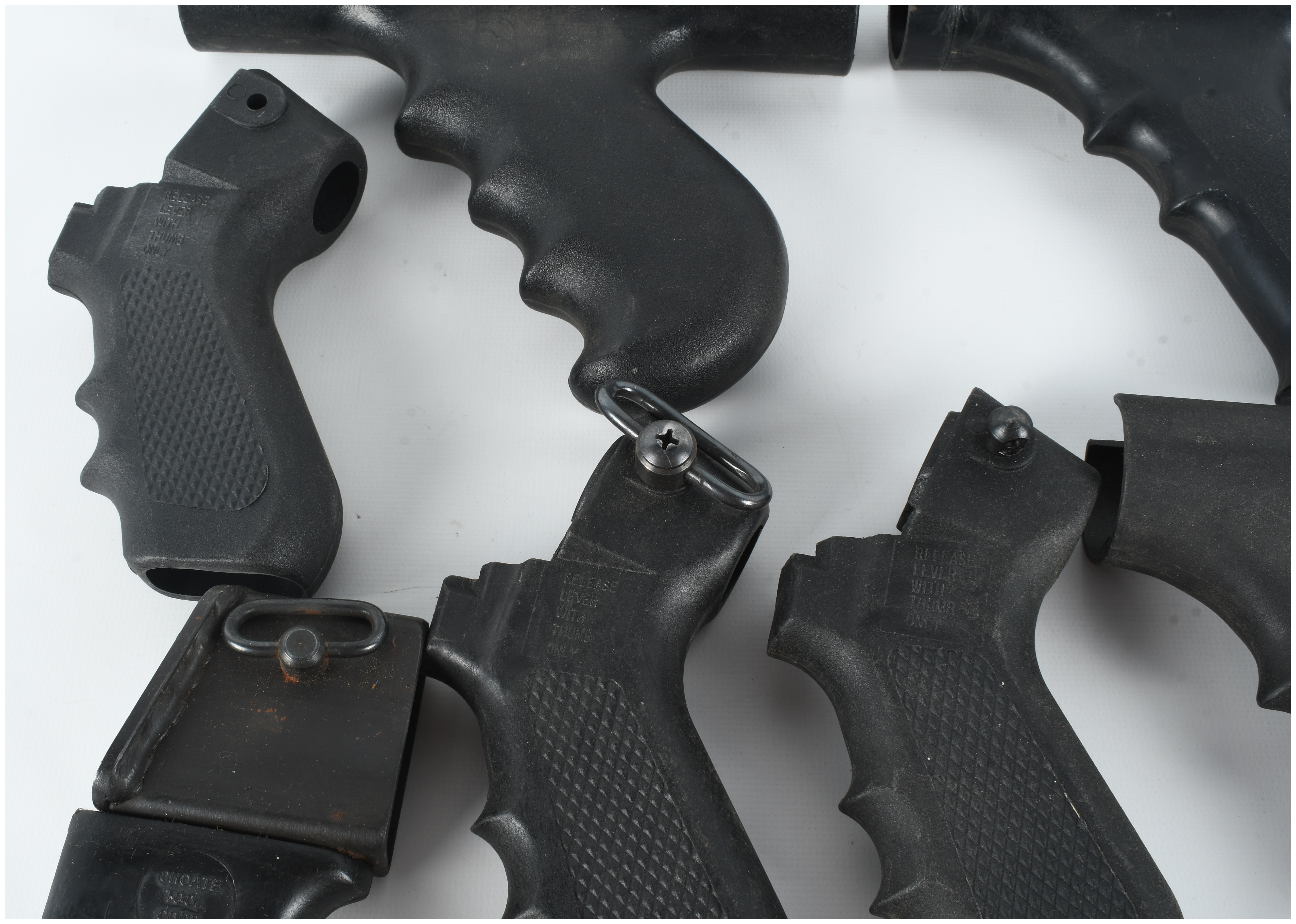 A Collection of 8 Assorted Polymer Shotgun Pistol Grips and Folding Stock Components