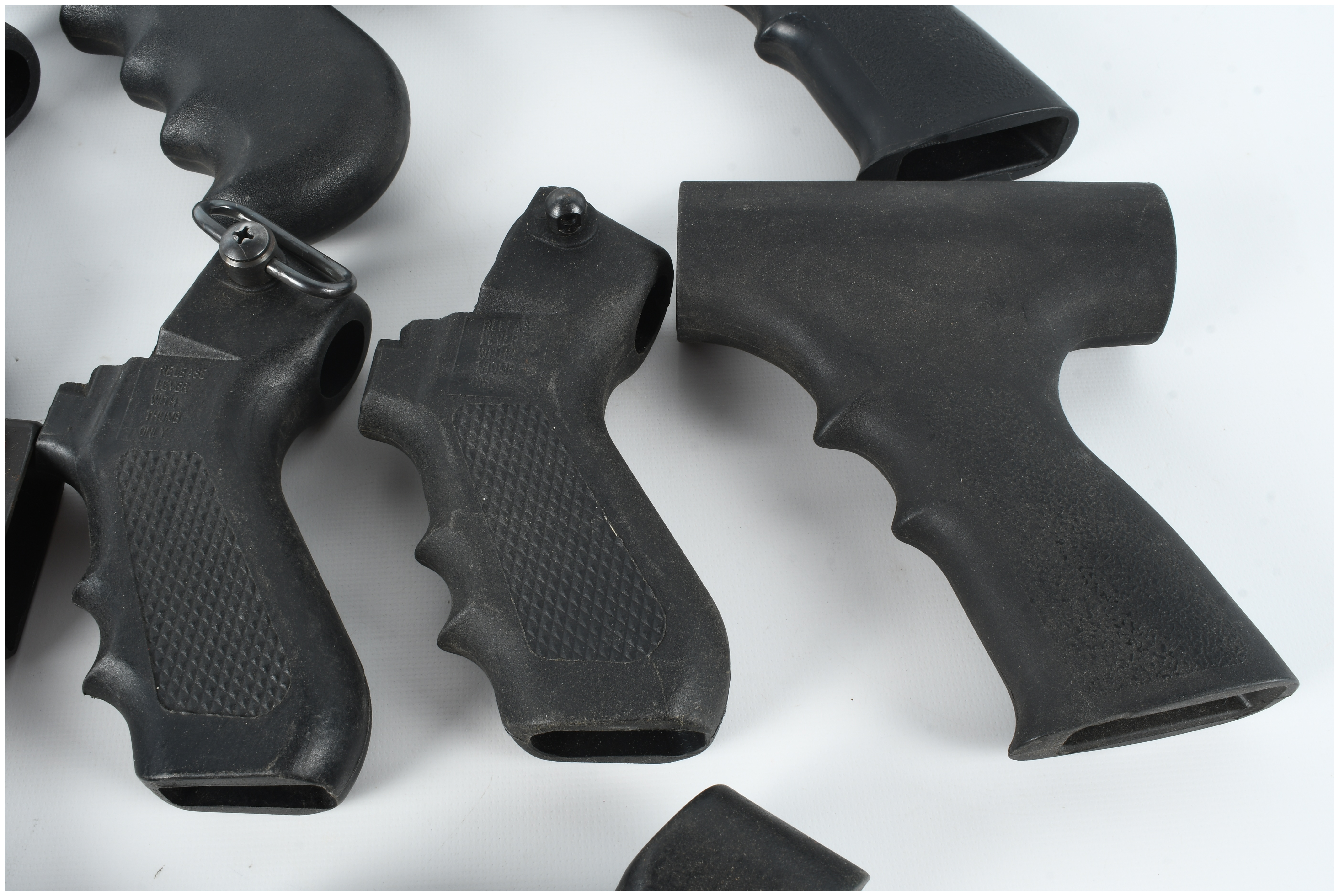 A Collection of 8 Assorted Polymer Shotgun Pistol Grips and Folding Stock Components