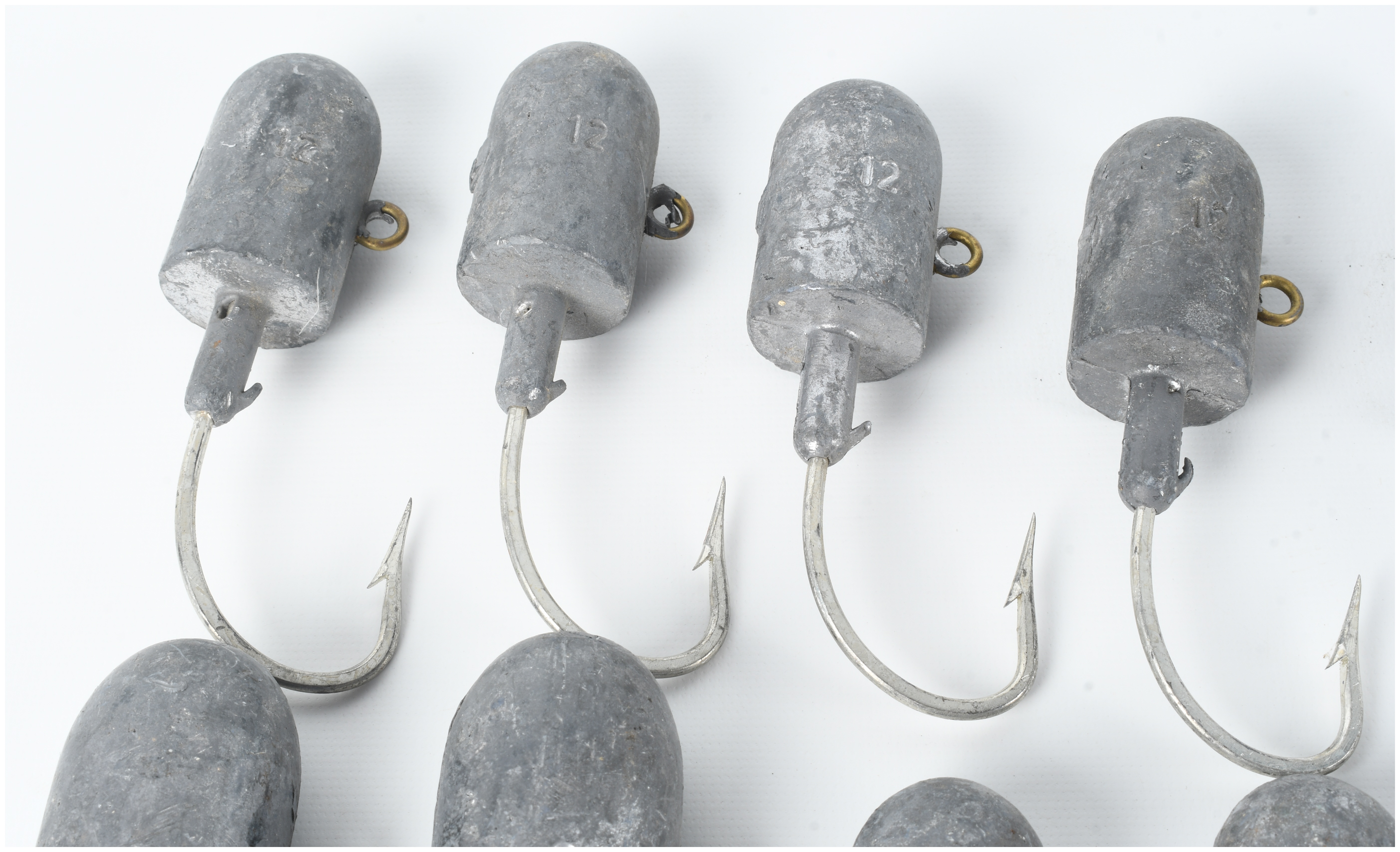 Ten Fishing Jig Heads with Embedded Lead Weights