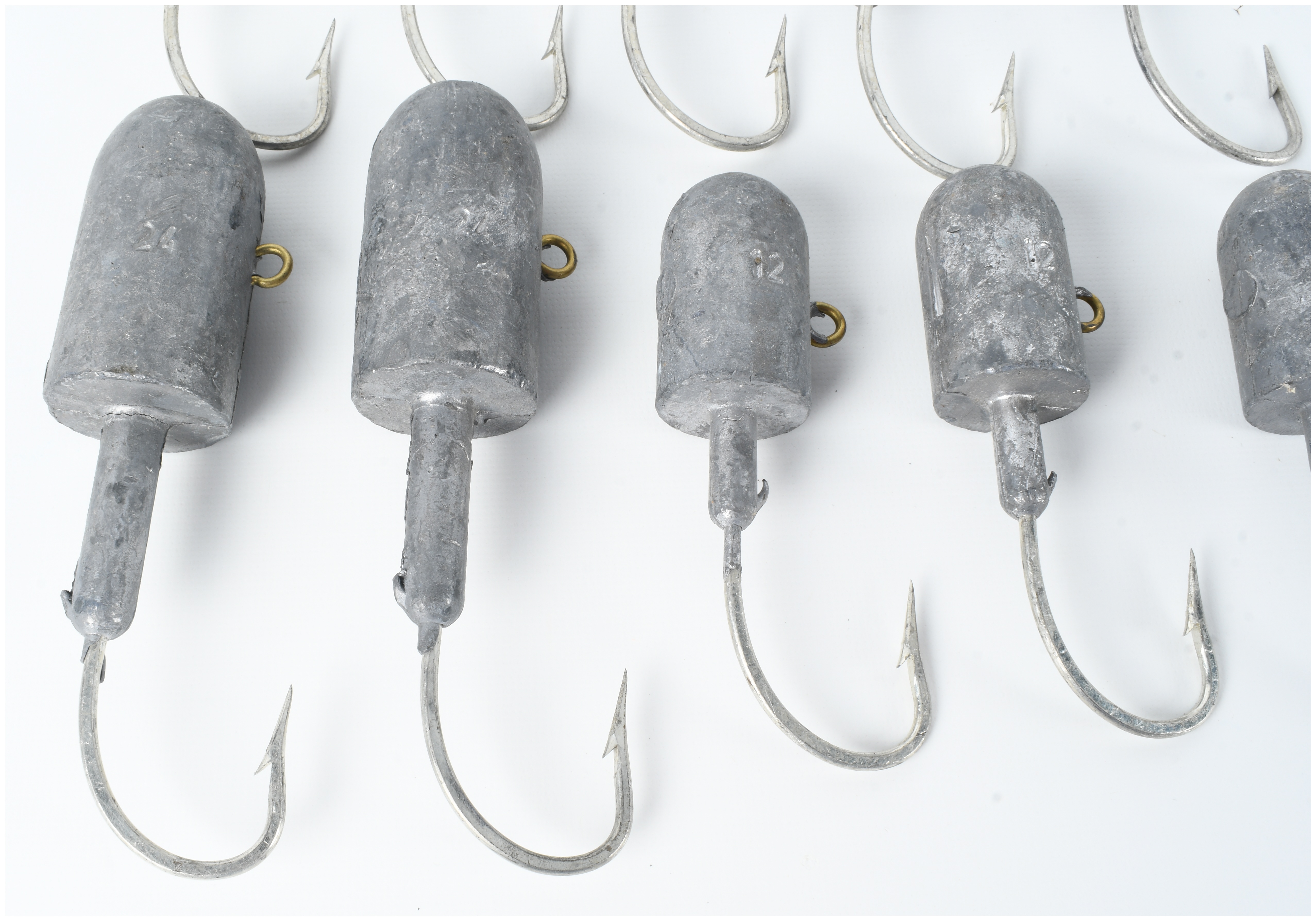 Ten Fishing Jig Heads with Embedded Lead Weights