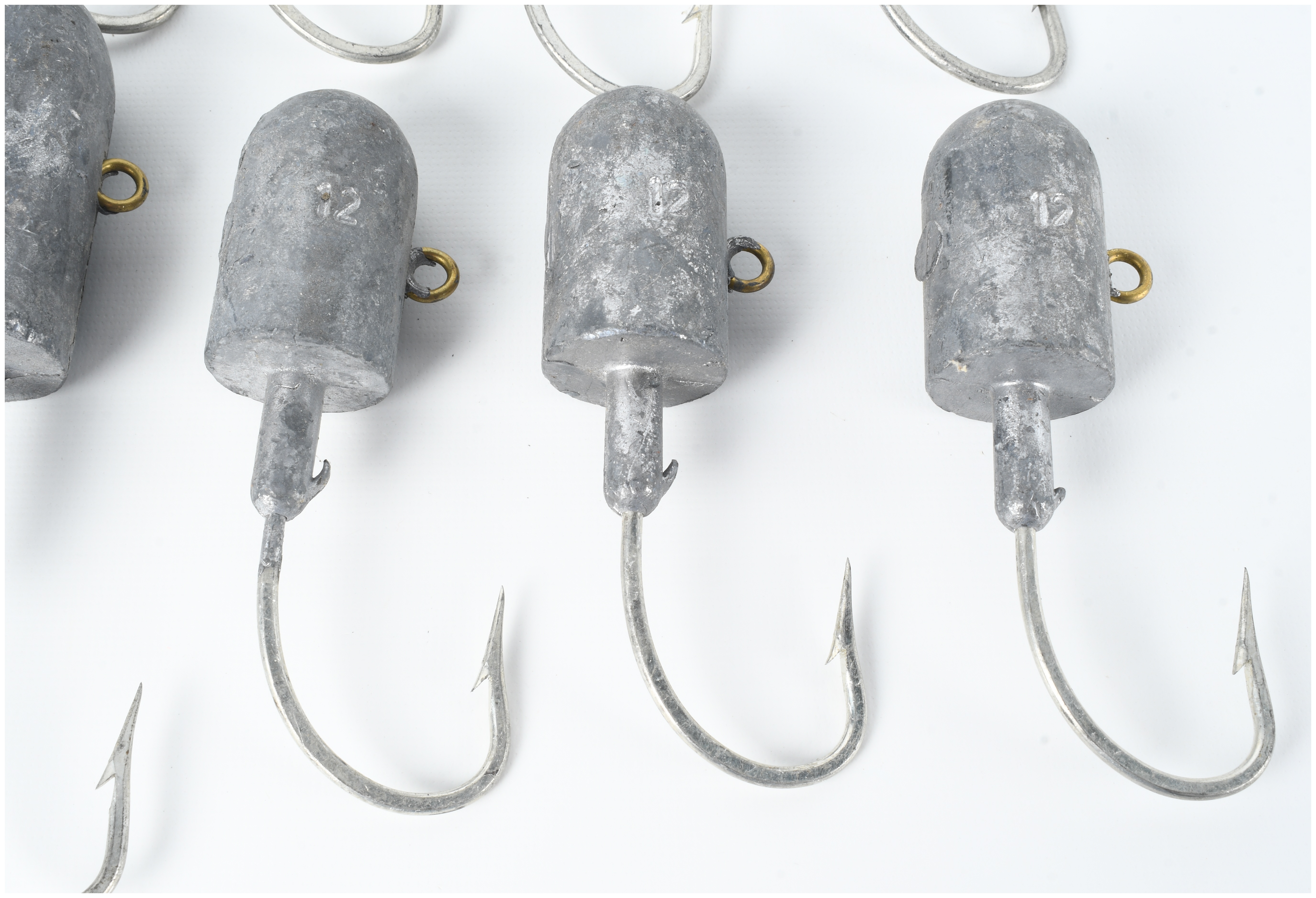 Ten Fishing Jig Heads with Embedded Lead Weights