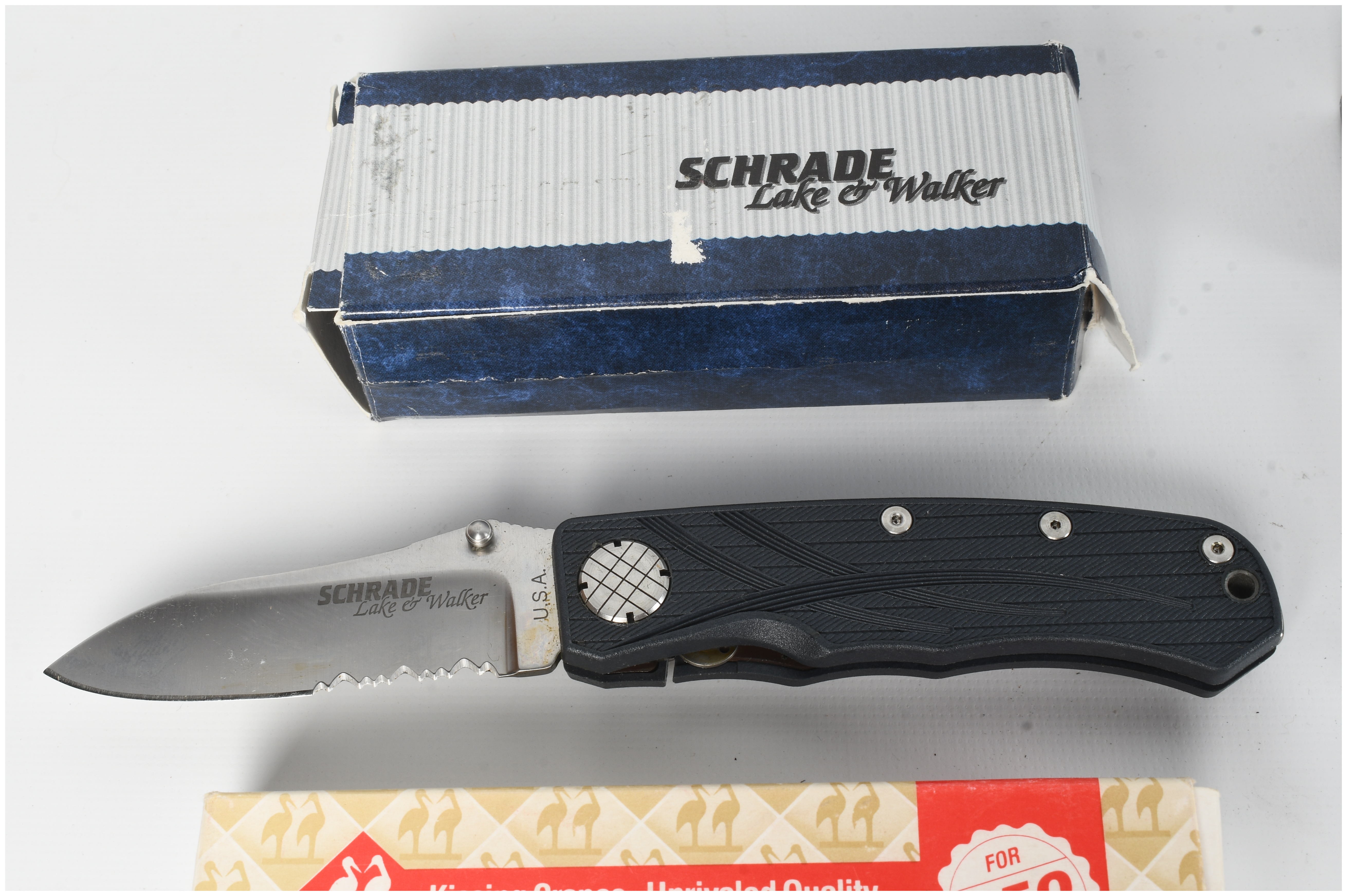 A Collection of Four Pocket Knives Including Schrade Kissing Cranes and Frost Cutlery with Boxes