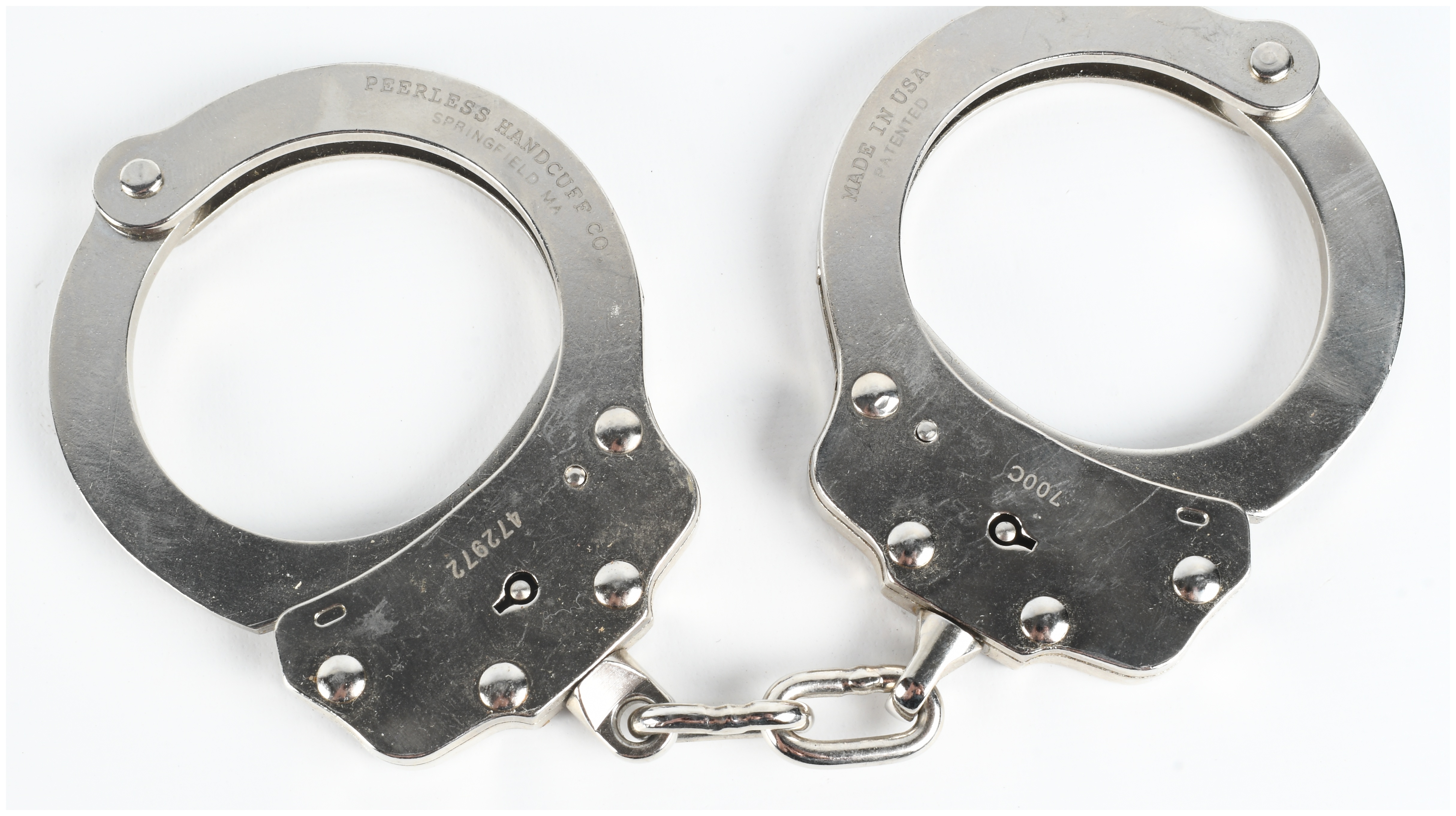 A Pair of Peerless Model 700C Nickel-Plated Chain Link Handcuffs with Original Box