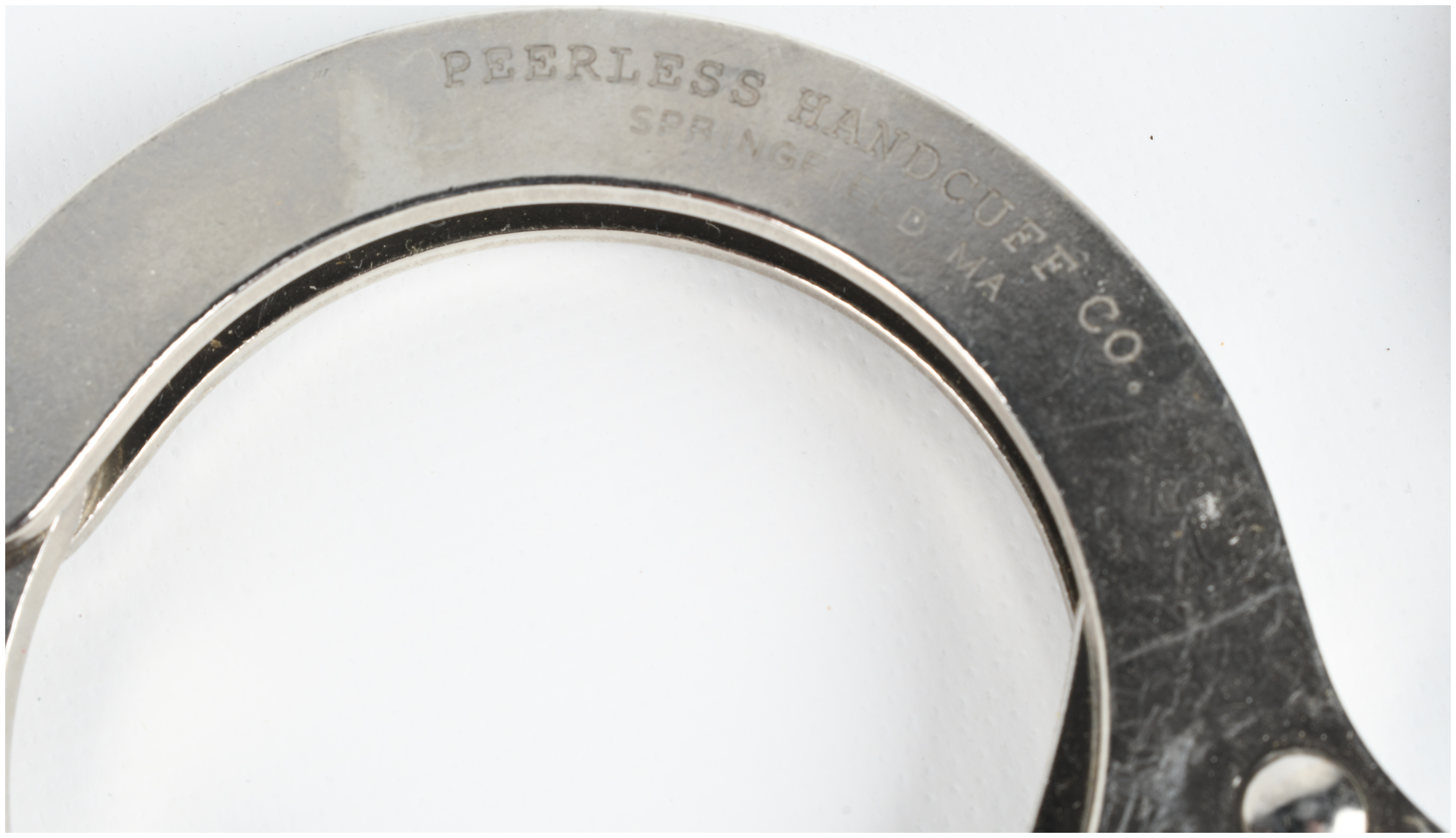 A Pair of Peerless Model 700C Nickel-Plated Chain Link Handcuffs with Original Box