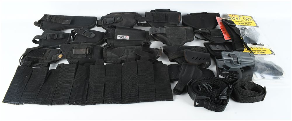 Lot 1058: An Assortment of Commercial Black Nylon Tactical Gear and Holsters
