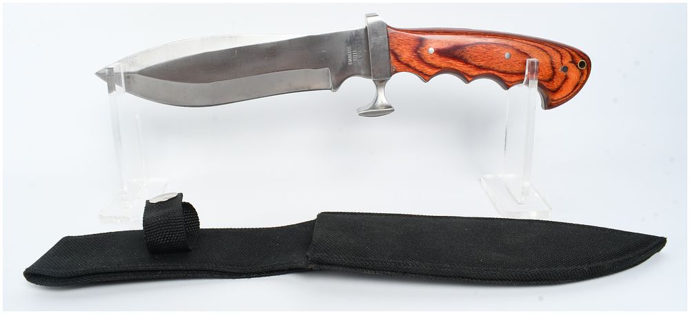 Lot 1085: A Large Bowie Style Fixed Blade Knife with Laminated Wood Handle