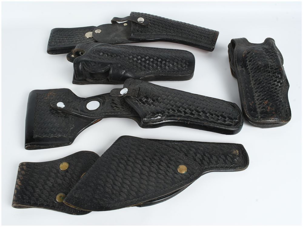 Lot 1118: A Collection of 5 Leather Basketweave Firearm Holsters