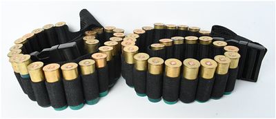 50 Remington-Peters 16 GA Shotgun Shells and Nylon Ammunition Belt. A collection of 50 16 GA 