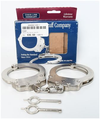 A Pair of Peerless Handcuff Company Model 700 Chain Link Handcuffs with Original Box and Keys. Th 