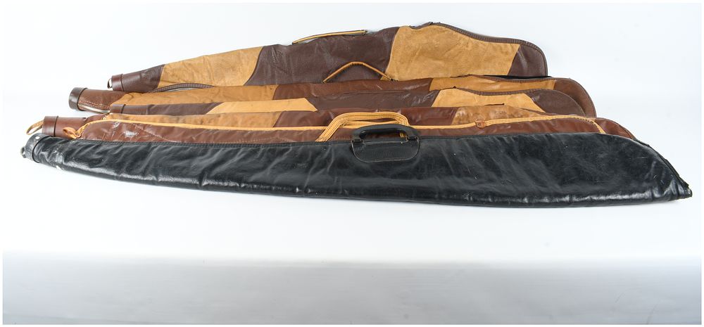 Lot 1160: A Collection of Six Vintage Leather and Faux Leather Soft Gun Cases