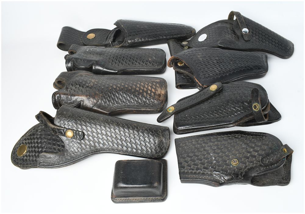 Lot 1208: Nine Vintage American Law Enforcement Basketweave Leather Holsters