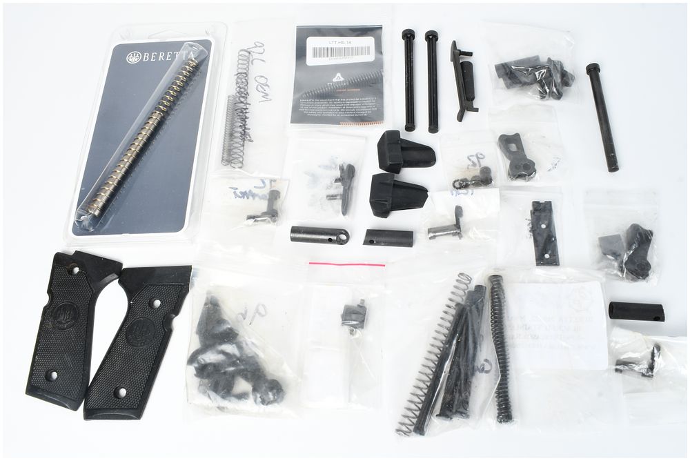Lot 1241: An Assortment of Beretta 92 and 92X Full and Compact Handgun Parts and Accessories
