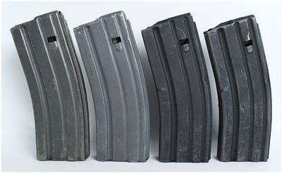 Four AR-15/M16 5.56mm 30-Round Metal Magazines. A bundle of 4 curved metal magazines designed 