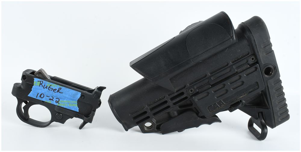 Lot 1315: Two Firearm Accessories Including a Ruger 10-22 Trigger Assembly and a CAA CBS16 Buttstock