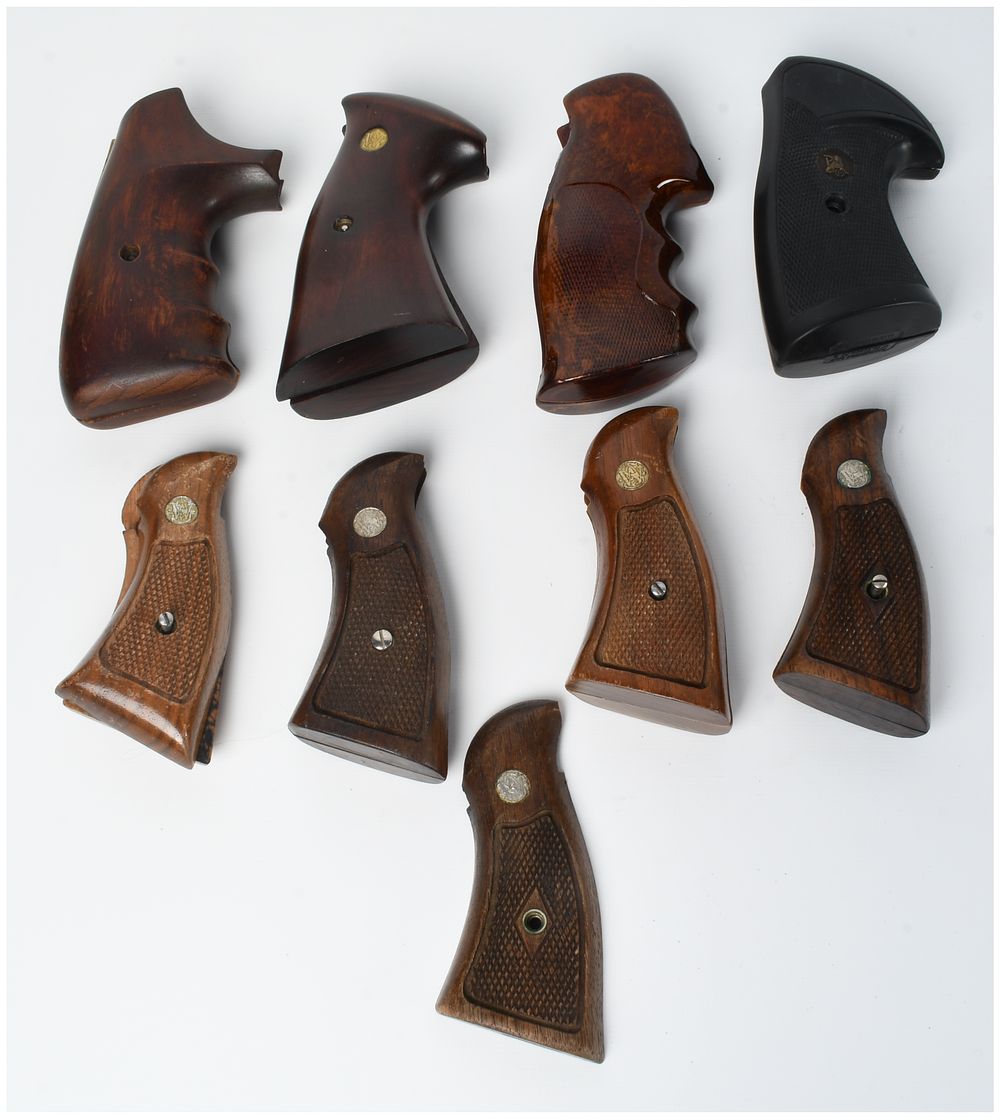 Lot 1421: A Collection of Nine Vintage Wood and Synthetic Pistol Grips