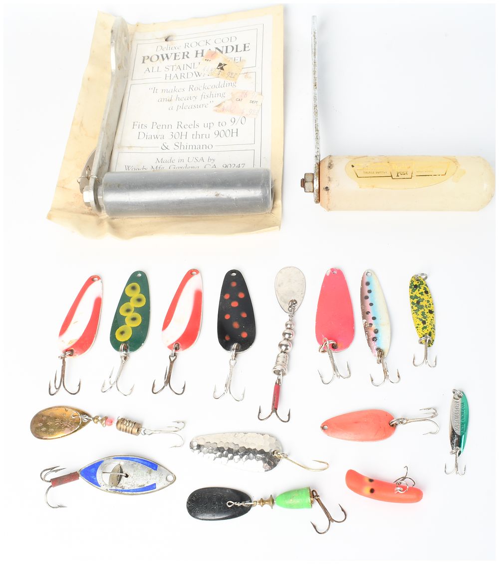 Lot 1424: An Assortment of Vintage Fishing Lures and Reel Power Handles including Woody Mfg., Mepps, and Blue Fox