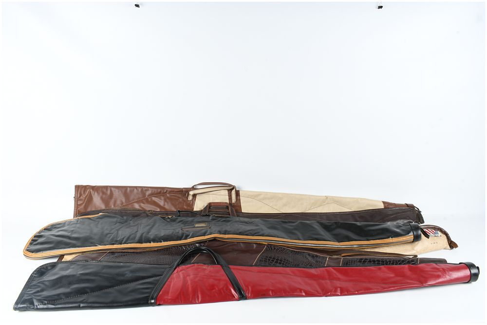 Lot 1430: A Collection of 7 Soft-Sided Long Gun Cases Including J.M. Bucheimer