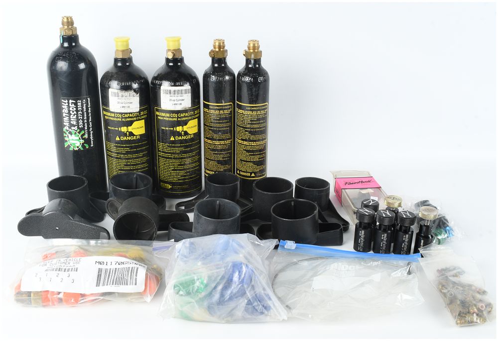 Lot 1442: A Collection of Paintball CO2 Cylinders, On-Off Adapters, and Maintenance Accessories