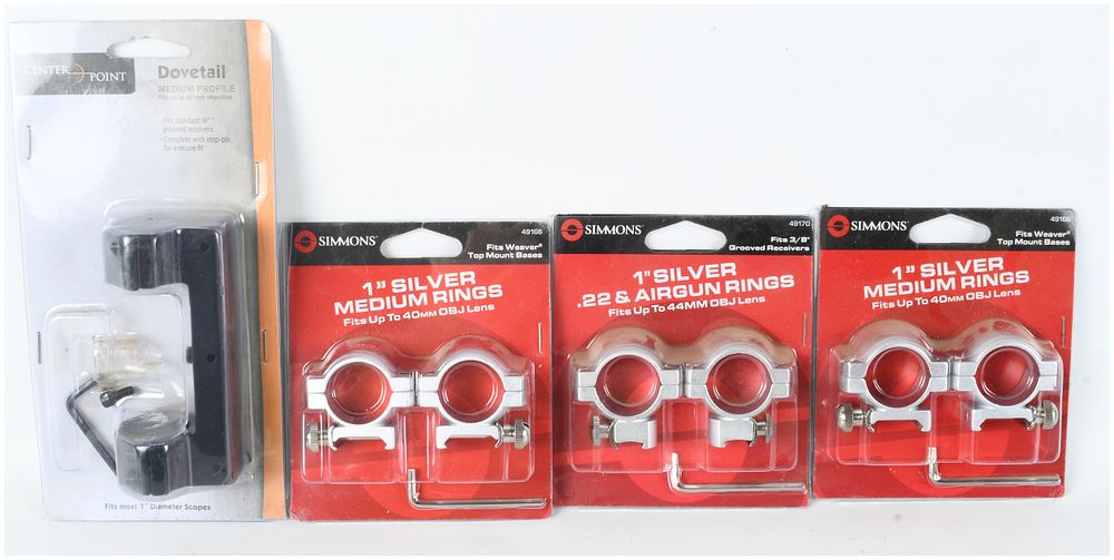 Lot 1533: A Collection of 4 CenterPoint and Simmons Scope Mounting Accessories including 1 Inch Silver Rings and Dovetail Mount