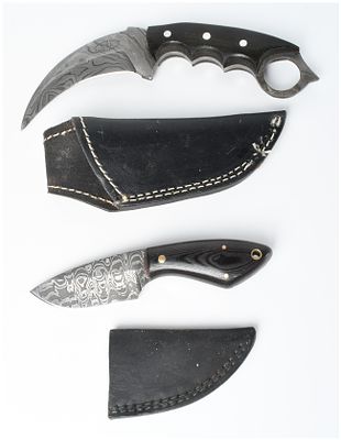 Two Fixed Blade Damascus Steel Knives including a CFK Cutlery Company Karambit and a Custom 