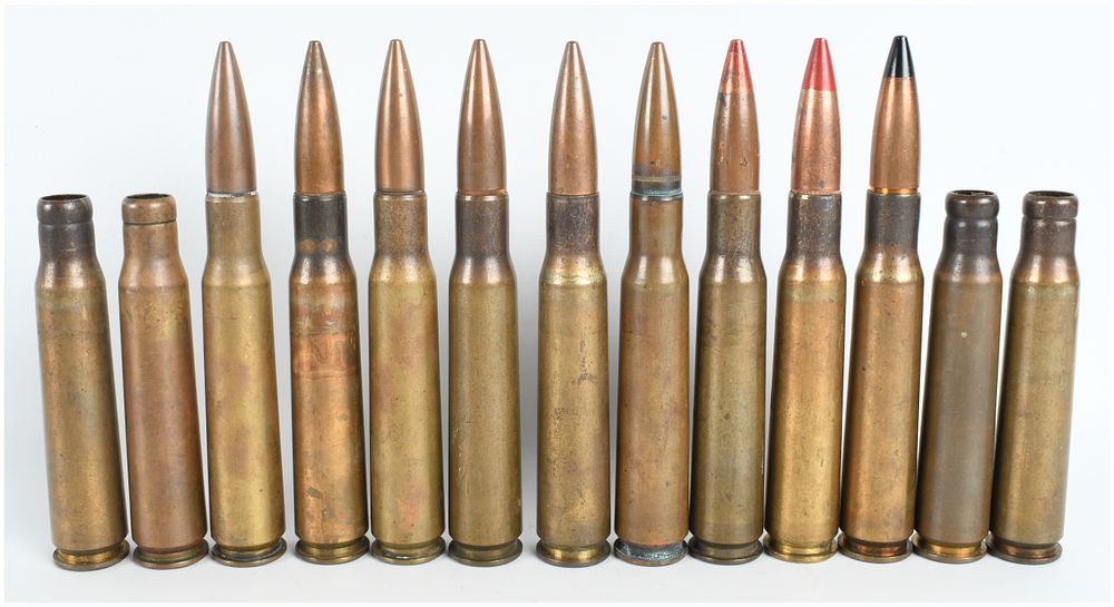 Lot 1573: A Collection of 13 World War II Era .50 BMG Cartridges and Casings