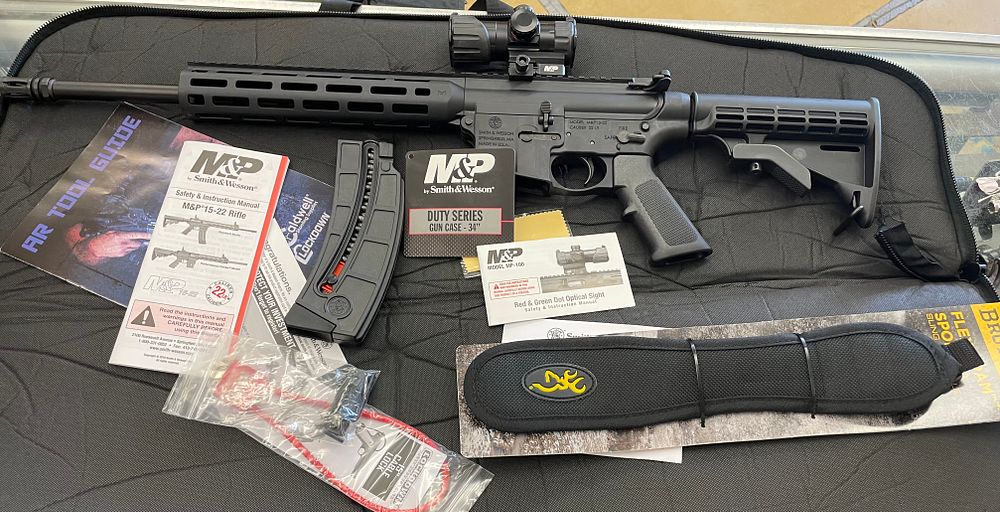 Lot 242: M&P 15-22 NEW case sling and paperwork