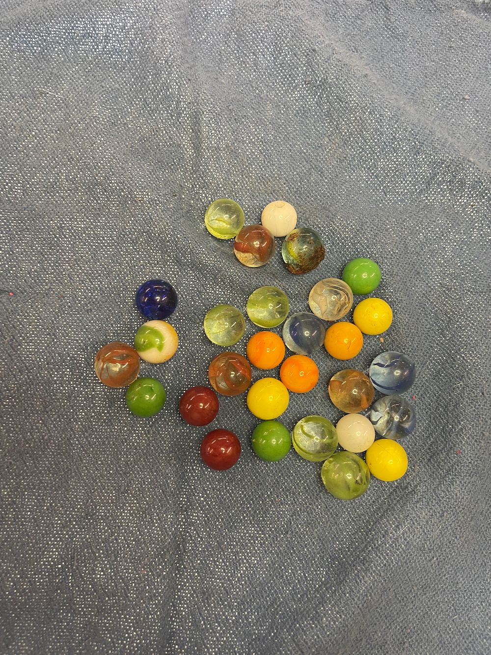 Lot 140: vintage marbles shipping 5 dollars