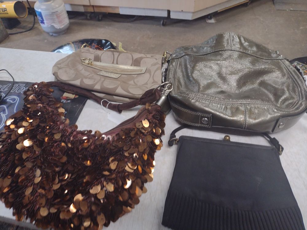 Lot 245: Four Purses Shipping $20.00