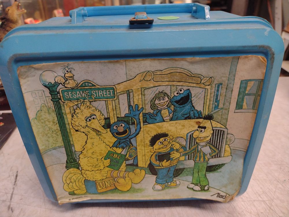 Lot 258: 1 Vintage Sesame Street Lunch Box with Thermos plastic Shipping $18.00