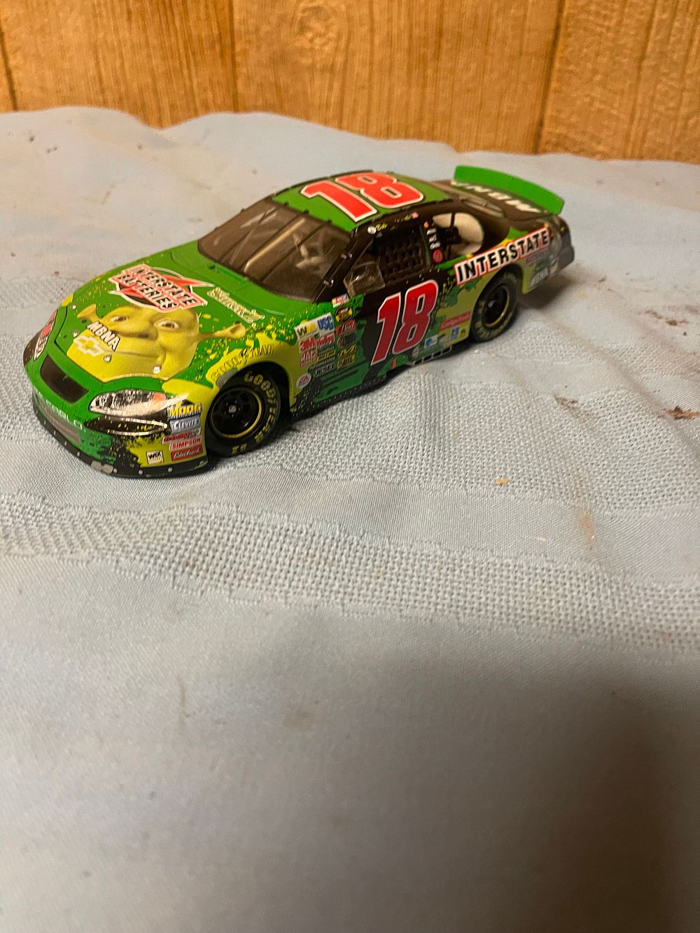 Lot 313: ACTION 2004 BOBBY LABONTE #18 CHEVY INTERSTATE BATTERIES...