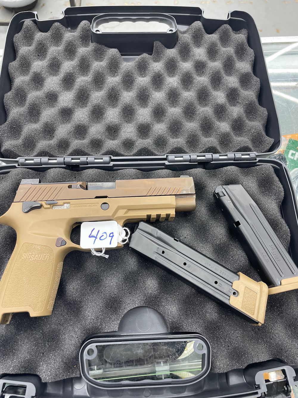 Lot 409: Sig Sauer Model 320-M17 with box two mags 17 rd and 21