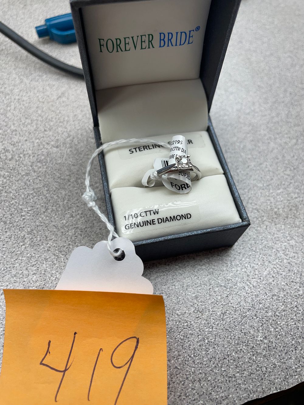 Lot 419: Sterling Silver 1/10 CTTW sz 7