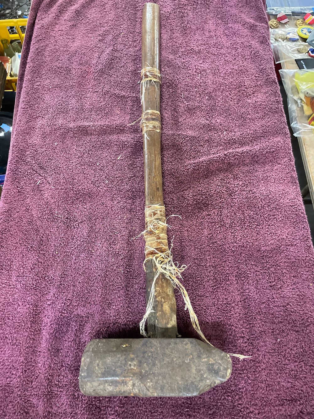 Lot 157: Rustic Metal Head Striking Tool with Fiber-Bound Wooden Handle