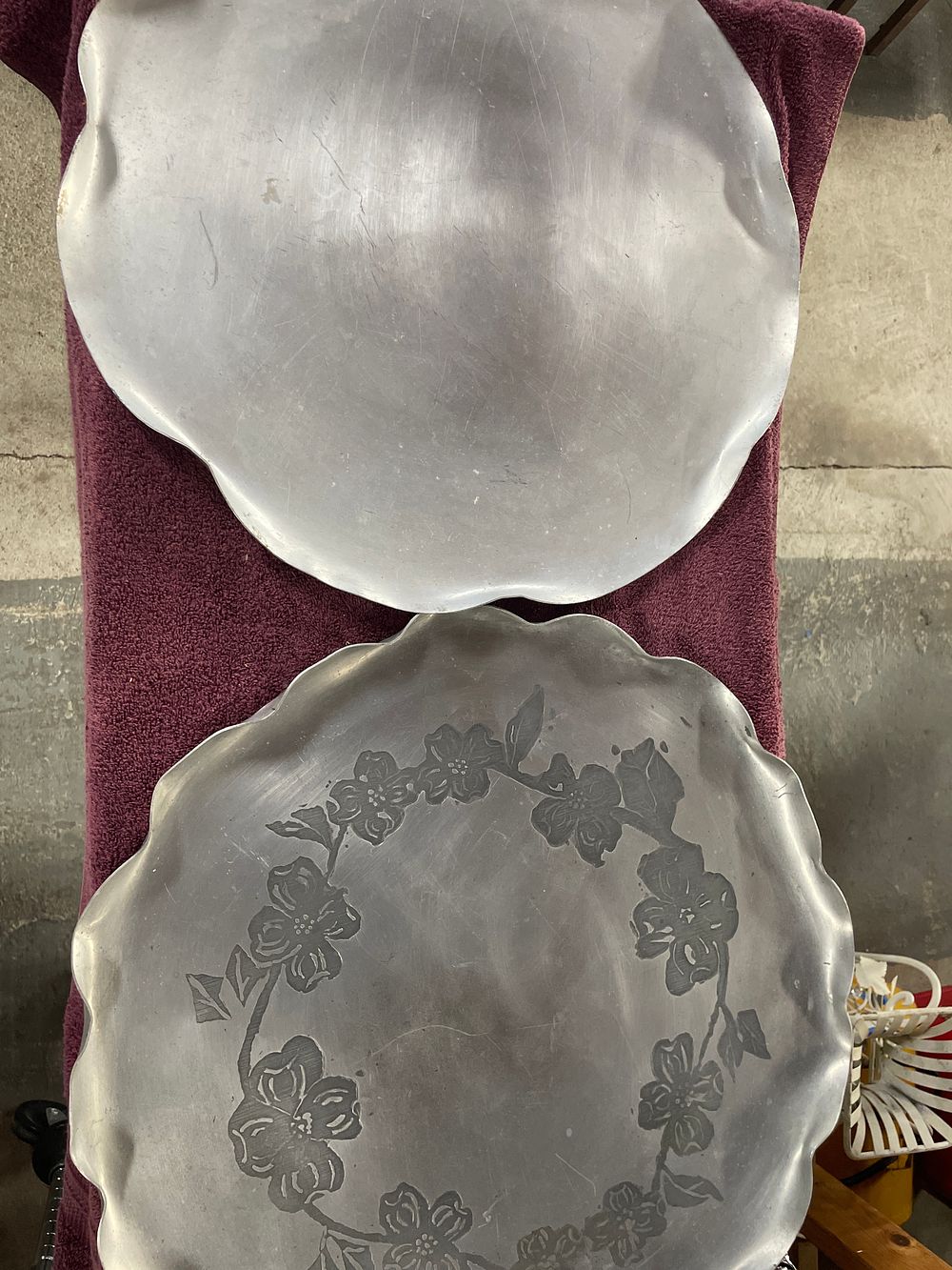 Lot 210: A Pair of Wendell August Forge Scalloped Aluminum Serving Platters