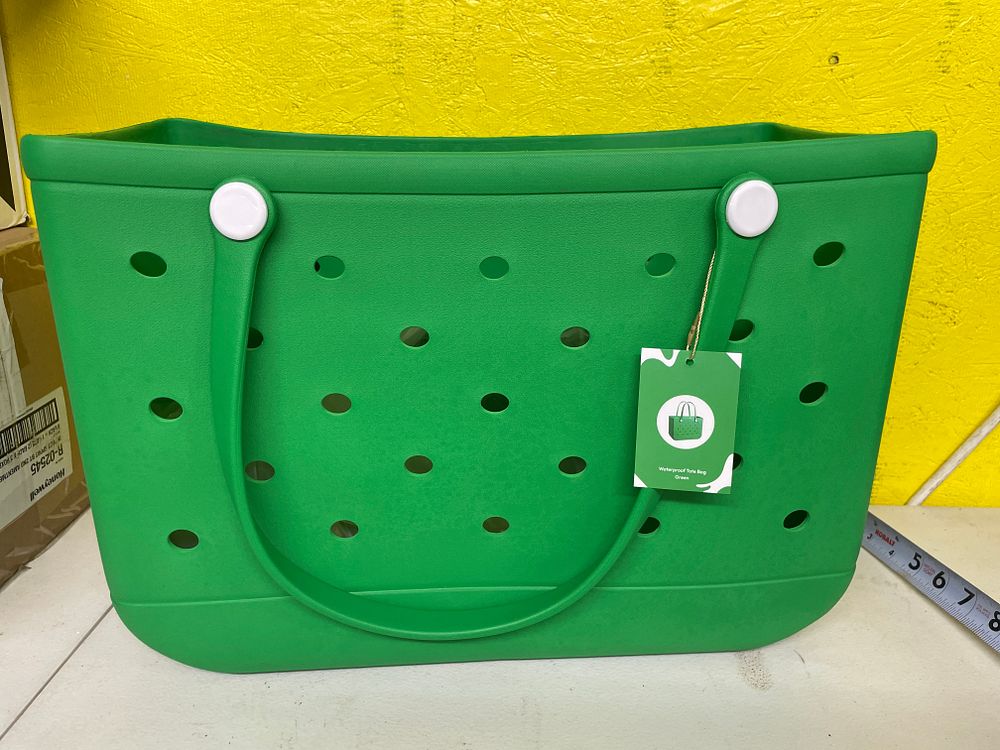 Lot 309: A Green Bogg Bag Perforated Tote Bag