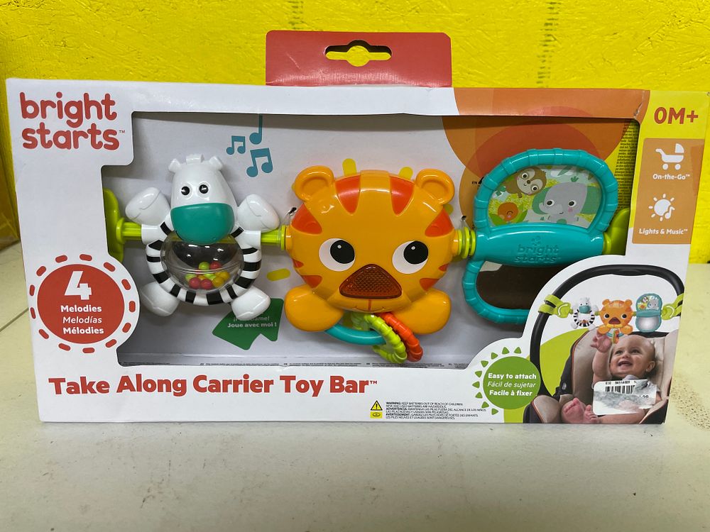 Lot 311: Bright Starts Take Along Carrier Toy Bar