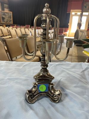 A Rubel Silvery-Colored Metal Candelabra. A silvery-colored metal Rubel candelabra, holding six 