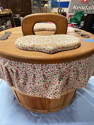 Vintage Wooden Sewing Basket with Split Lid and Heart Inserts. A round, light brown wooden 