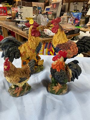 A Group of Four Multi-Colored Resin Rooster and Hen Figurines. Four multi-colored rooster and 