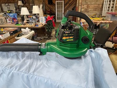 sold for parts we cannot get to run One Green and Black BLOWER VAC WEED EATER BV1650 Leaf 