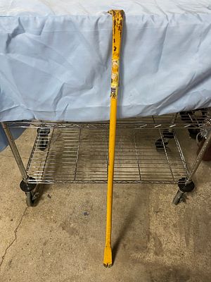 A DEWALT Yellow Pry Bar. A single yellow pry bar with 'DEWALT' inscribed in black letters on its 