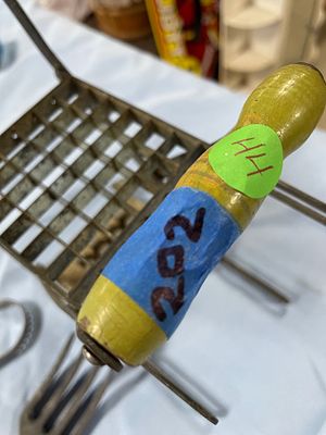 Vintage Metal Potato Chipper Dicer with Wooden Handles. A metal potato chipper/dicer 