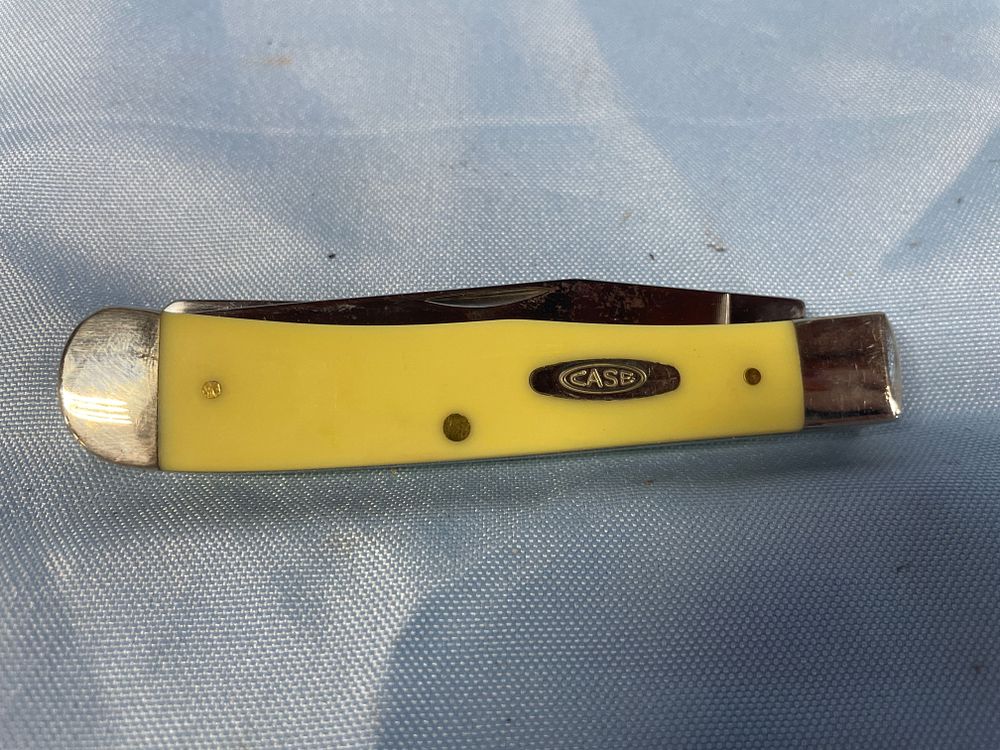 Lot 155: A Case Yellow and Silver Trapper