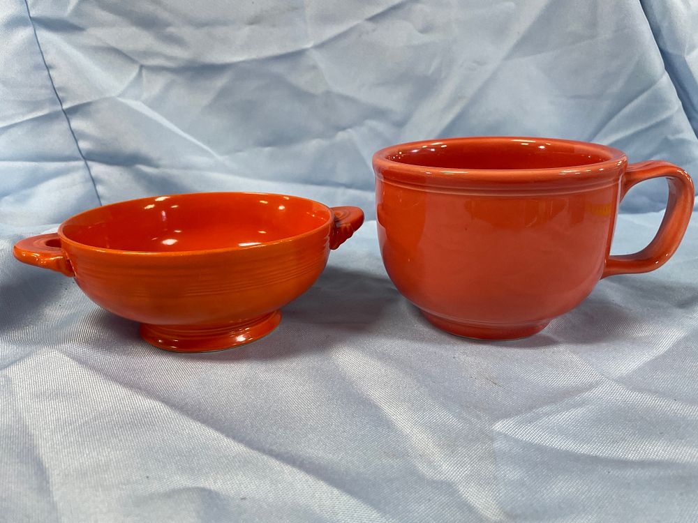 Lot 185: A Pair of Fiesta Homer Laughlin Persimmon Jumbo Cup and Onion Soup Bowl