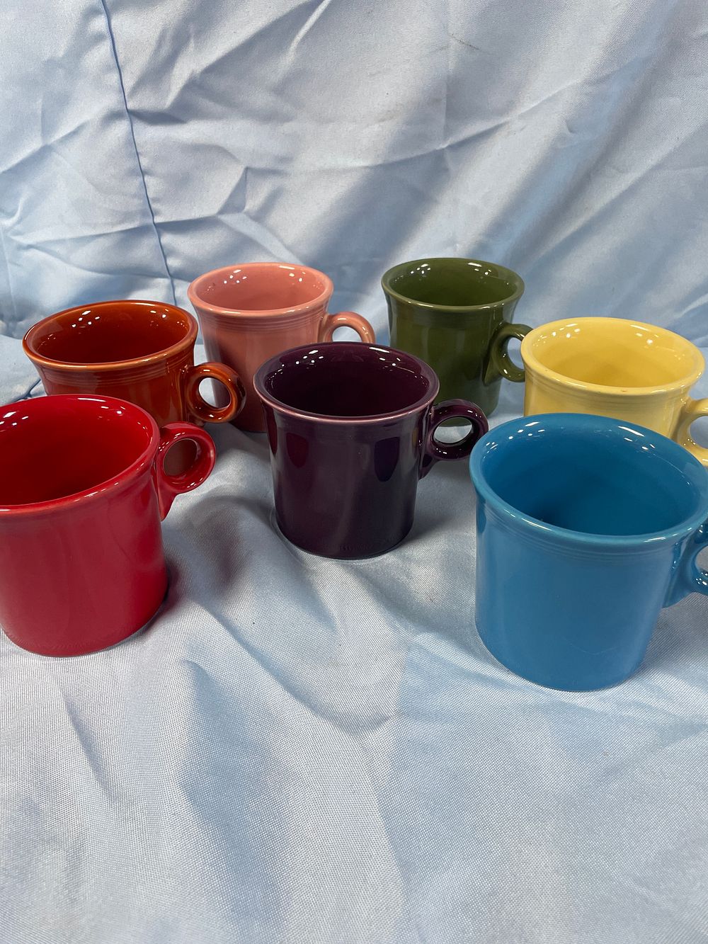 Lot 188: A Set of Seven Fiesta Homer Laughlin China (HLC) Ceramic Coffee Mugs, Assorted Colors