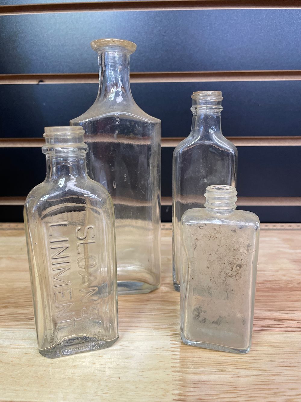 Lot 195: Four Antique Clear Glass Medicine Bottles, Sloan's Liniment